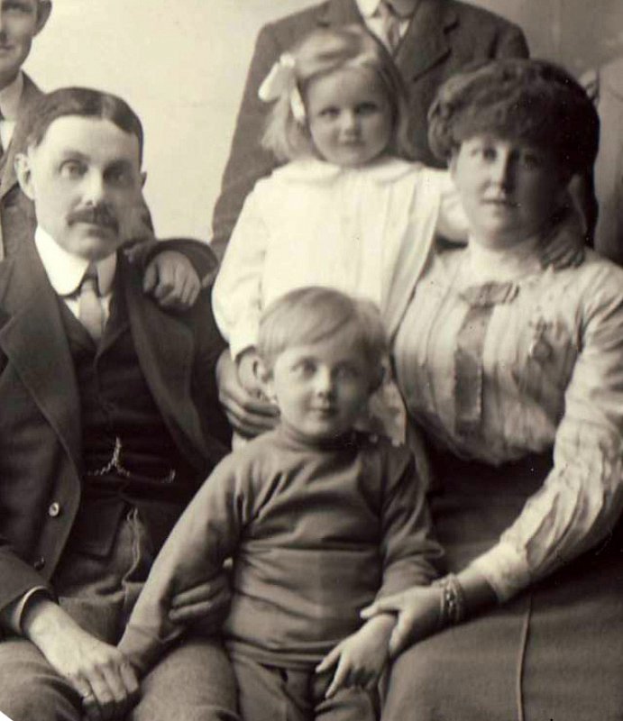 Brian with his parents and sister Mamie